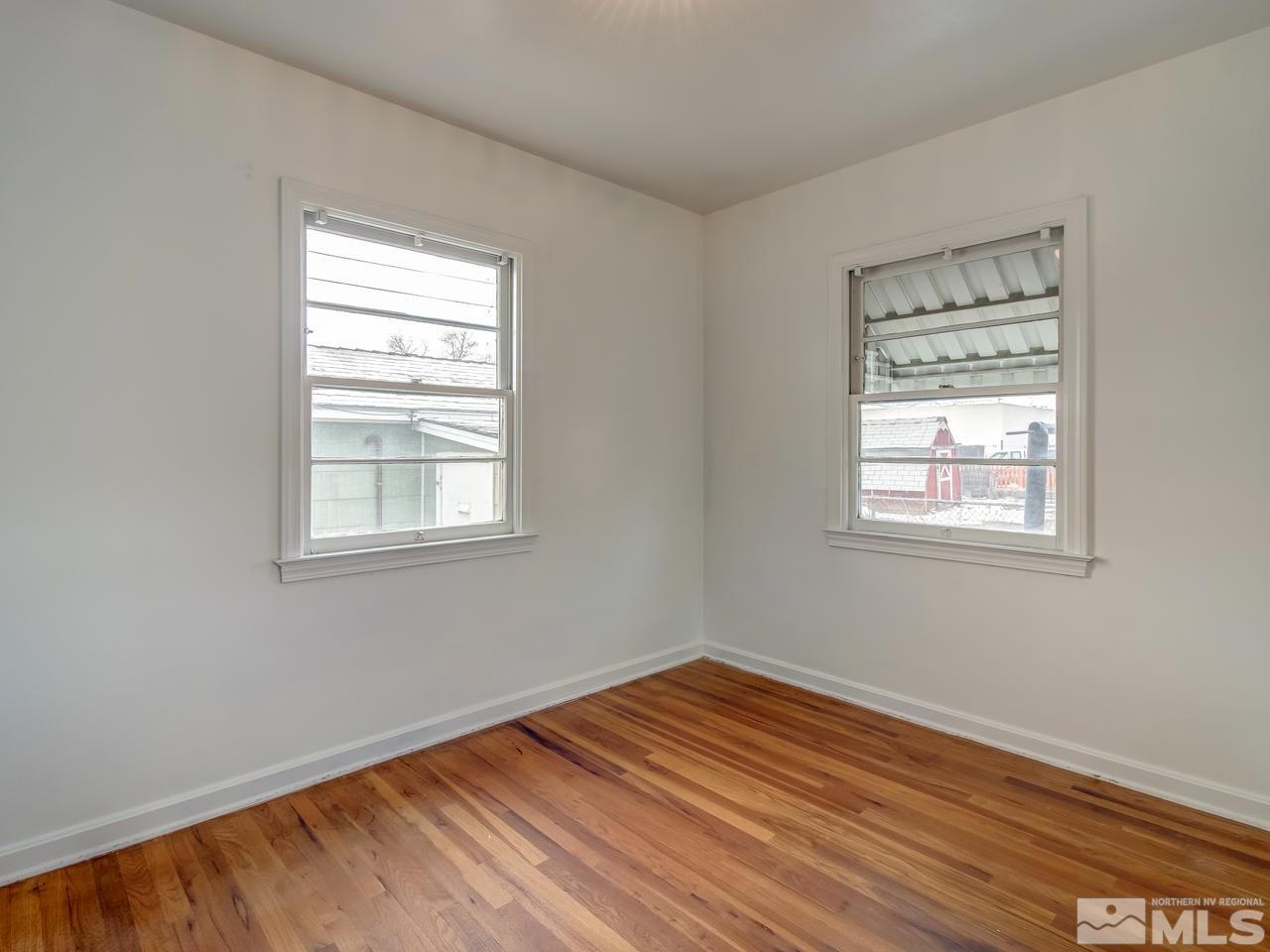 1215 Wheeler Avenue Reno, NV 89502 - Photo 17 of 25 a view of empty room with window and wooden floor