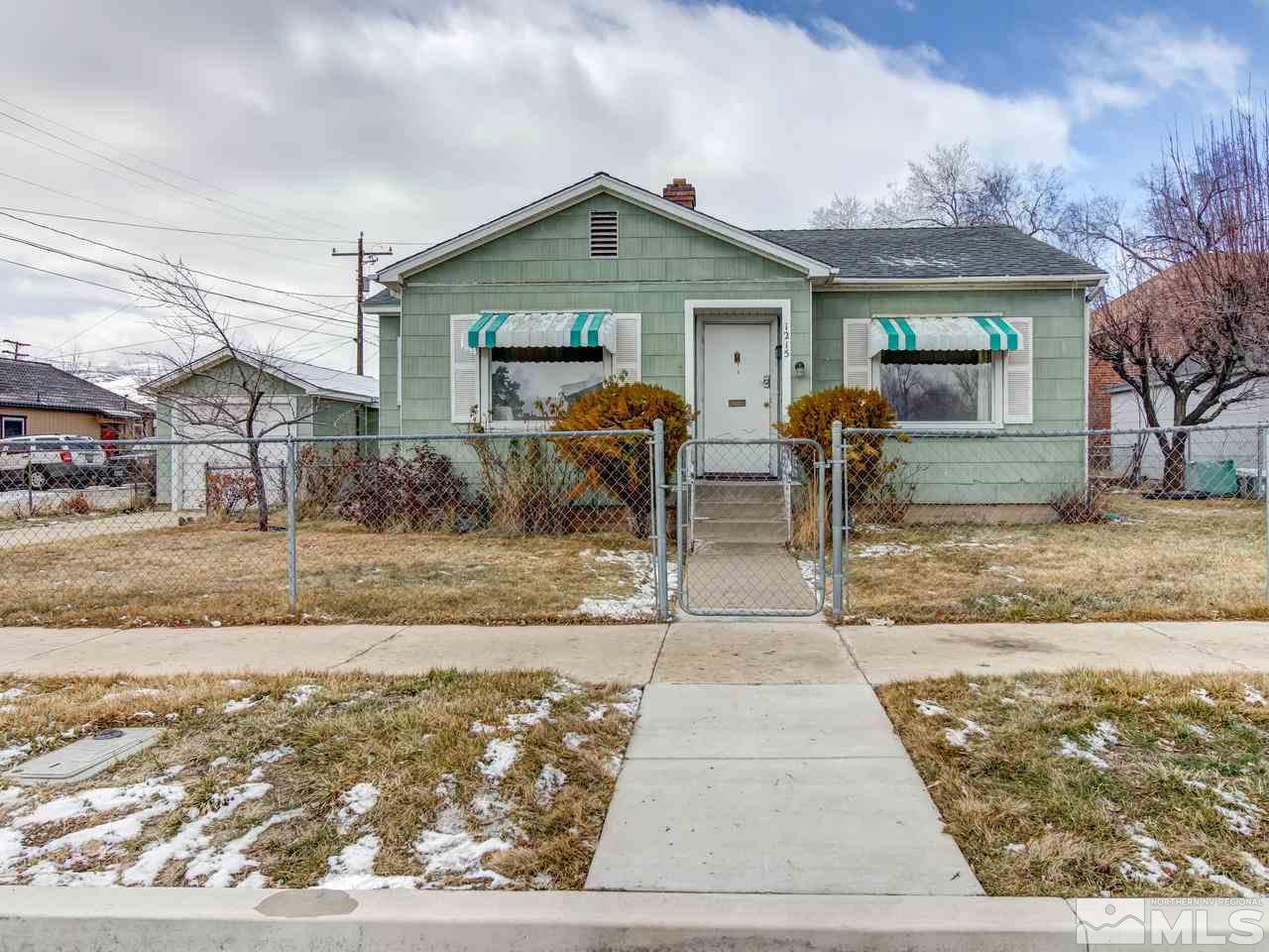 1215 Wheeler Avenue Reno, NV 89502 - Photo 2 of 25 a front view of a house with garden