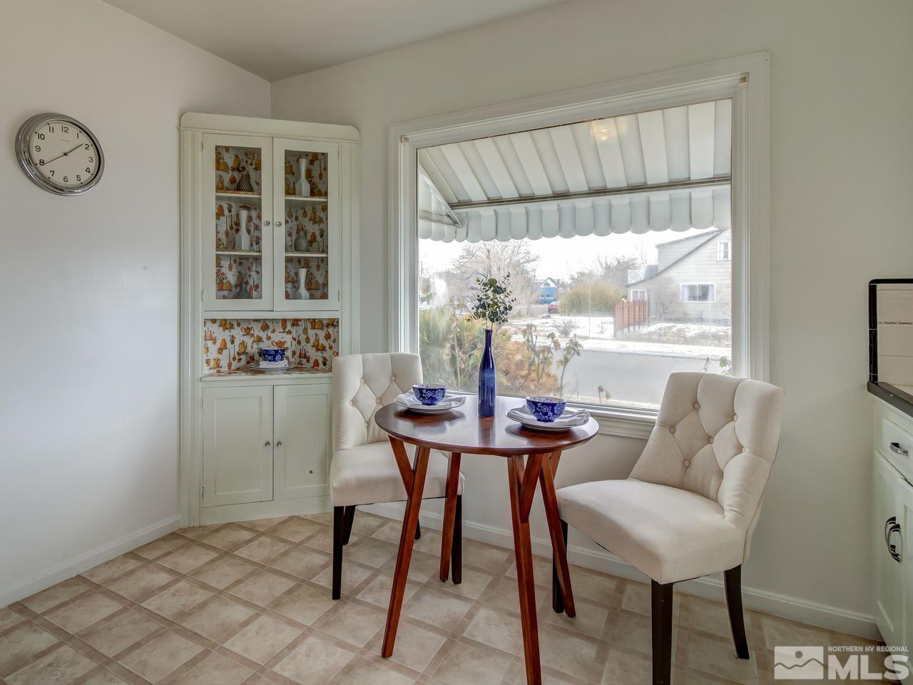1215 Wheeler Avenue Reno, NV 89502 - Photo 8 of 25 a view of a dining room with furniture window and outside view