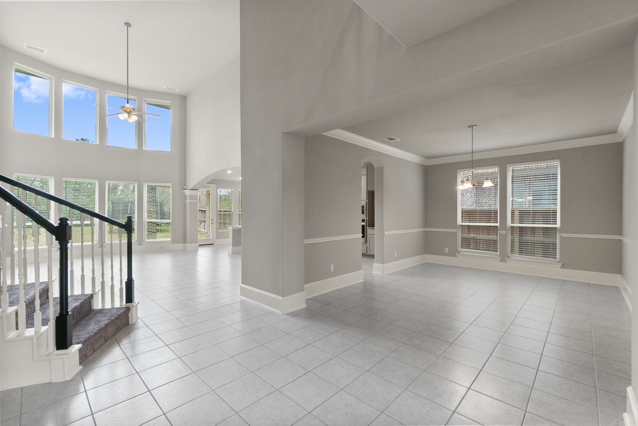 8710 Burdekin Road Magnolia, TX 77354 - Photo 6 of 49 a view of an empty room with glass door and windows