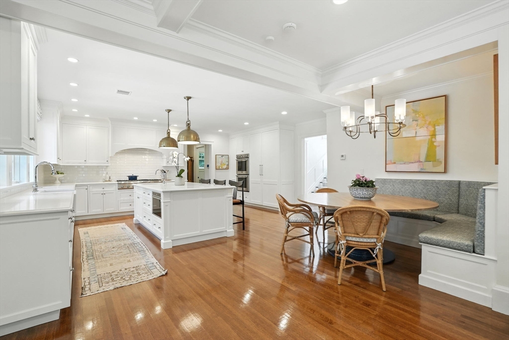 15 Winthrop Road Lexington, MA 02421 - Photo 17 of 39 a large kitchen with a table and chairs