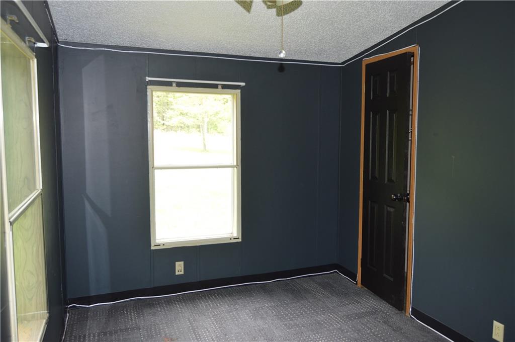 122 Arrowhead Road Emlenton, PA 16373 - Photo 11 of 21 a view of an empty room with a window