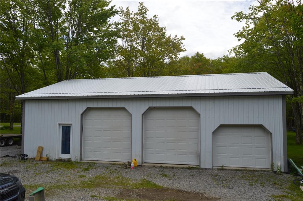 122 Arrowhead Road Emlenton, PA 16373 - Photo 21 of 21 a backyard of house with large trees