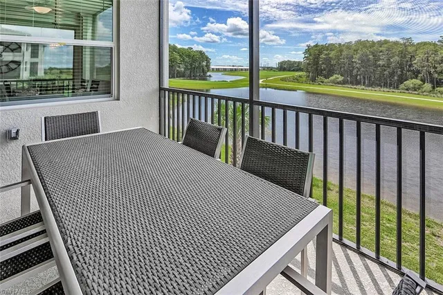 a view of a balcony with wooden floor