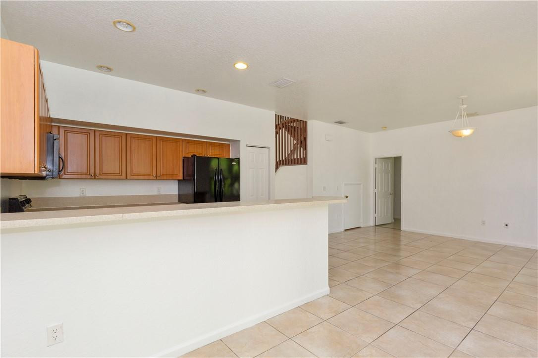 1801 Northwest 3rd Street Pompano Beach, FL 33069 - Photo 11 of 25 a view of a livingroom with wooden furniture