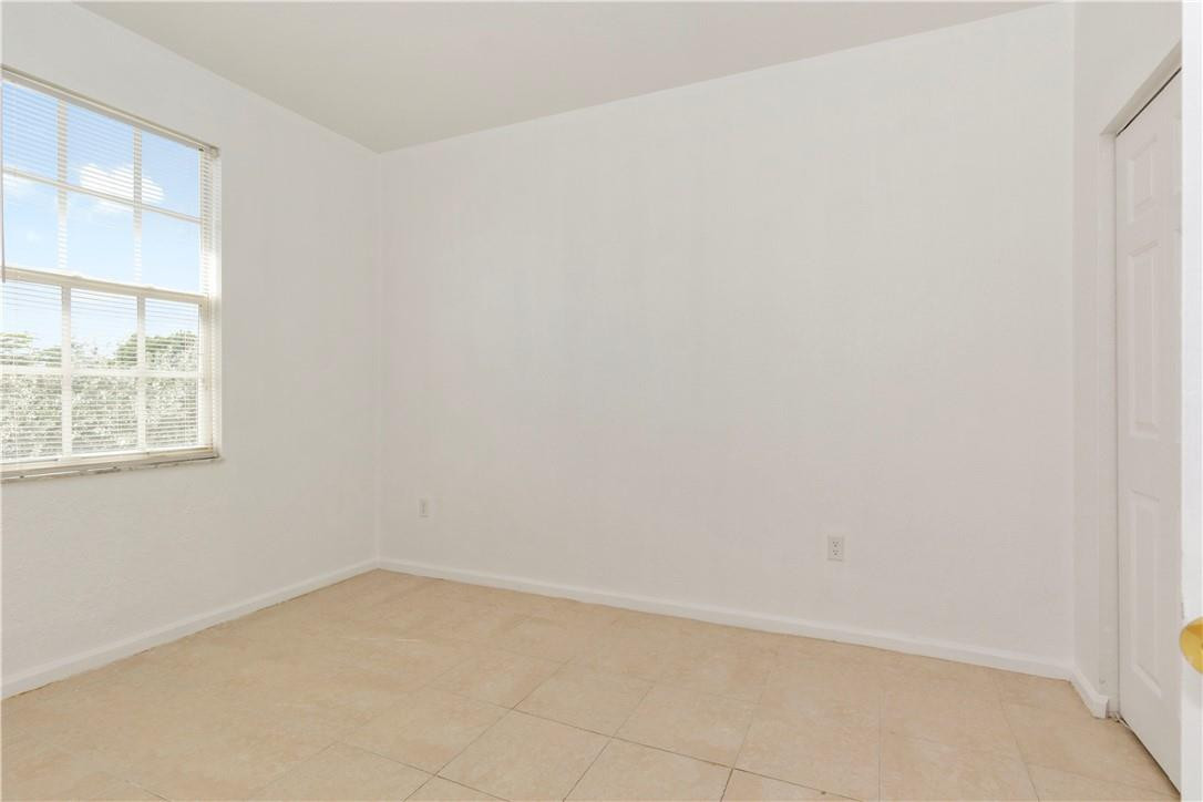 1801 Northwest 3rd Street Pompano Beach, FL 33069 - Photo 20 of 25 an empty room with a window