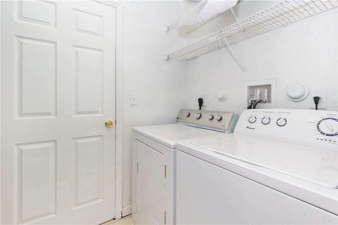 1801 Northwest 3rd Street Pompano Beach, FL 33069 - Photo 21 of 25 a utility room with dryer and washer