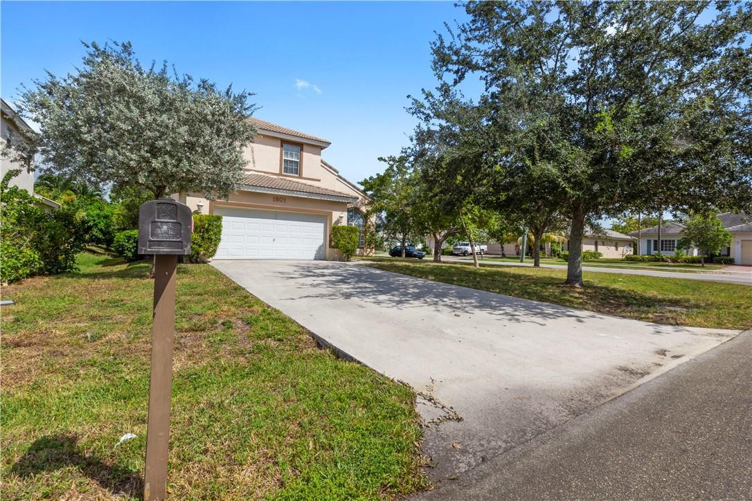 1801 Northwest 3rd Street Pompano Beach, FL 33069 - Photo 3 of 25 a view of a yard with plants and trees