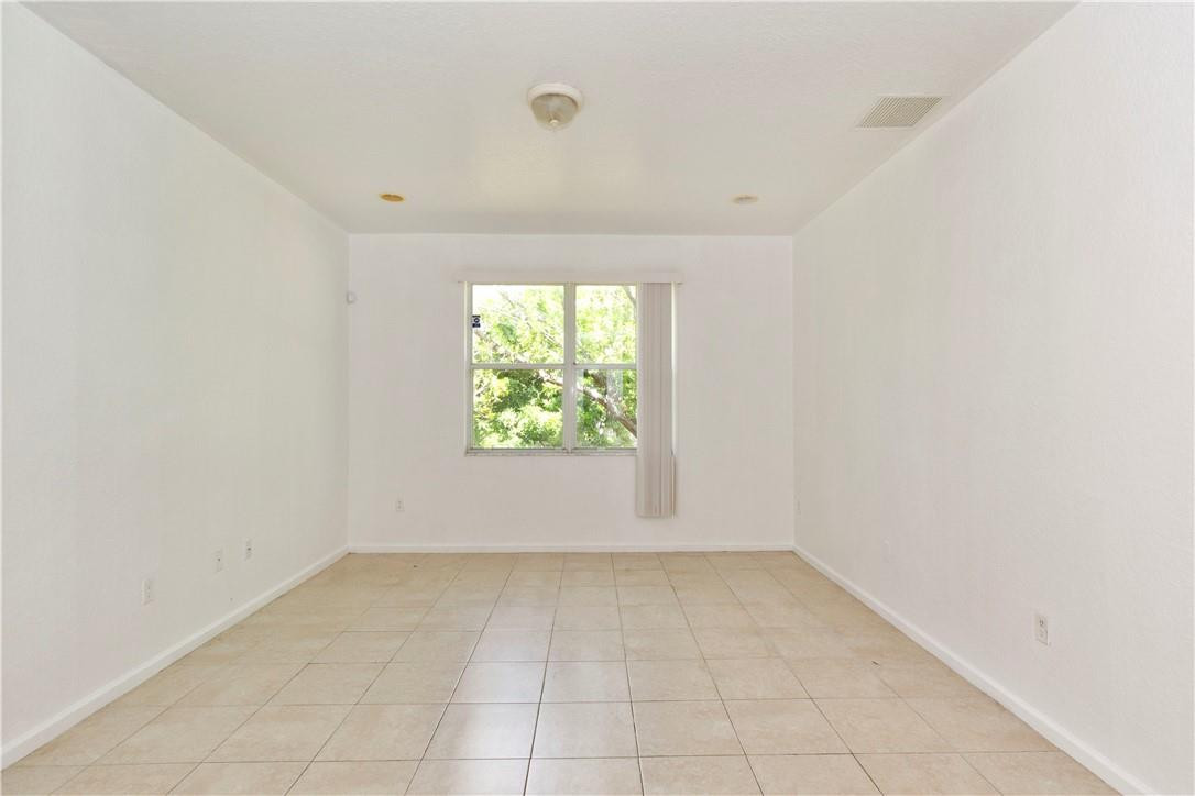 1801 Northwest 3rd Street Pompano Beach, FL 33069 - Photo 7 of 25 an empty room with windows