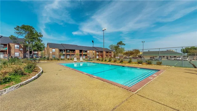 a view of a swimming pool and outdoor space