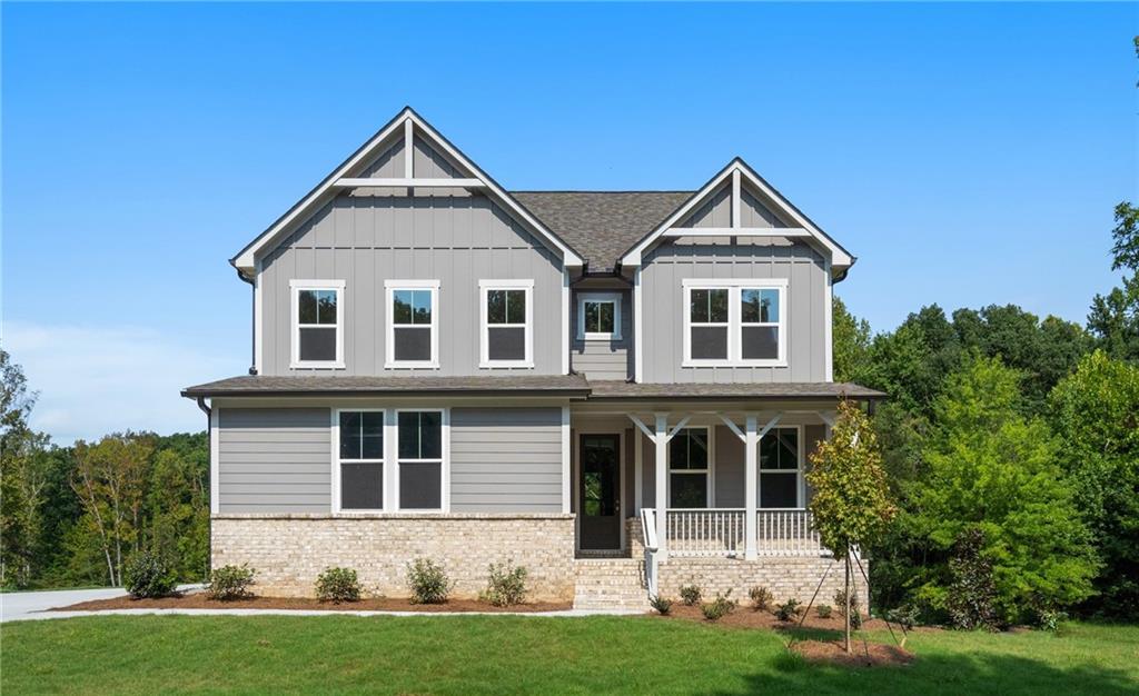 38 Brookside Way Cartersville, GA 30121 - Photo 1 of 1 a front view of a house with a yard and trees