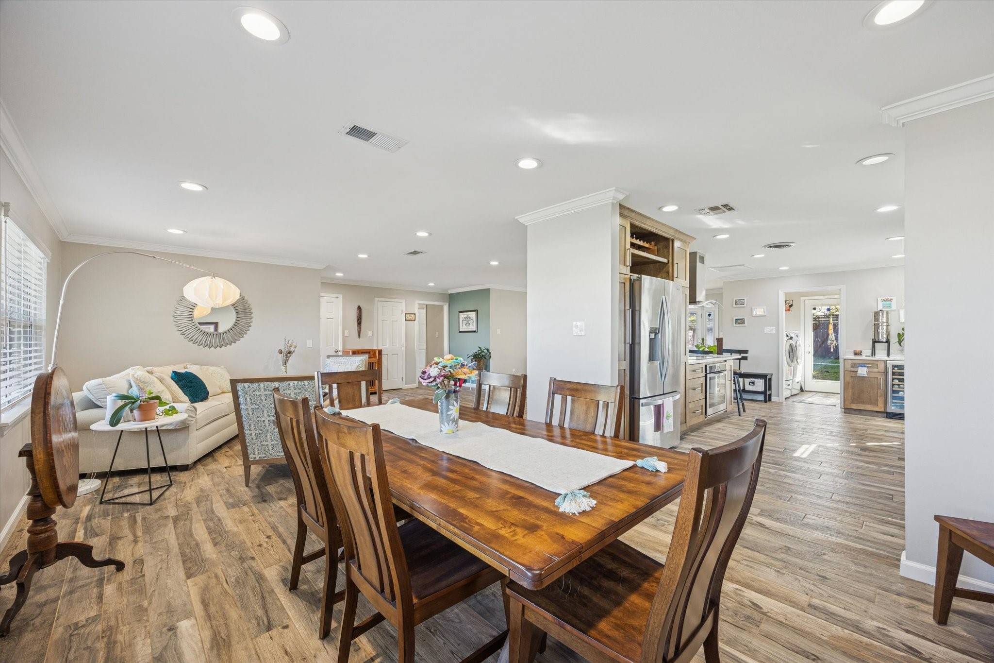 4423 Lemac Drive Houston, TX 77096 - Photo 15 of 30 a view of a dining room with furniture and wooden floor