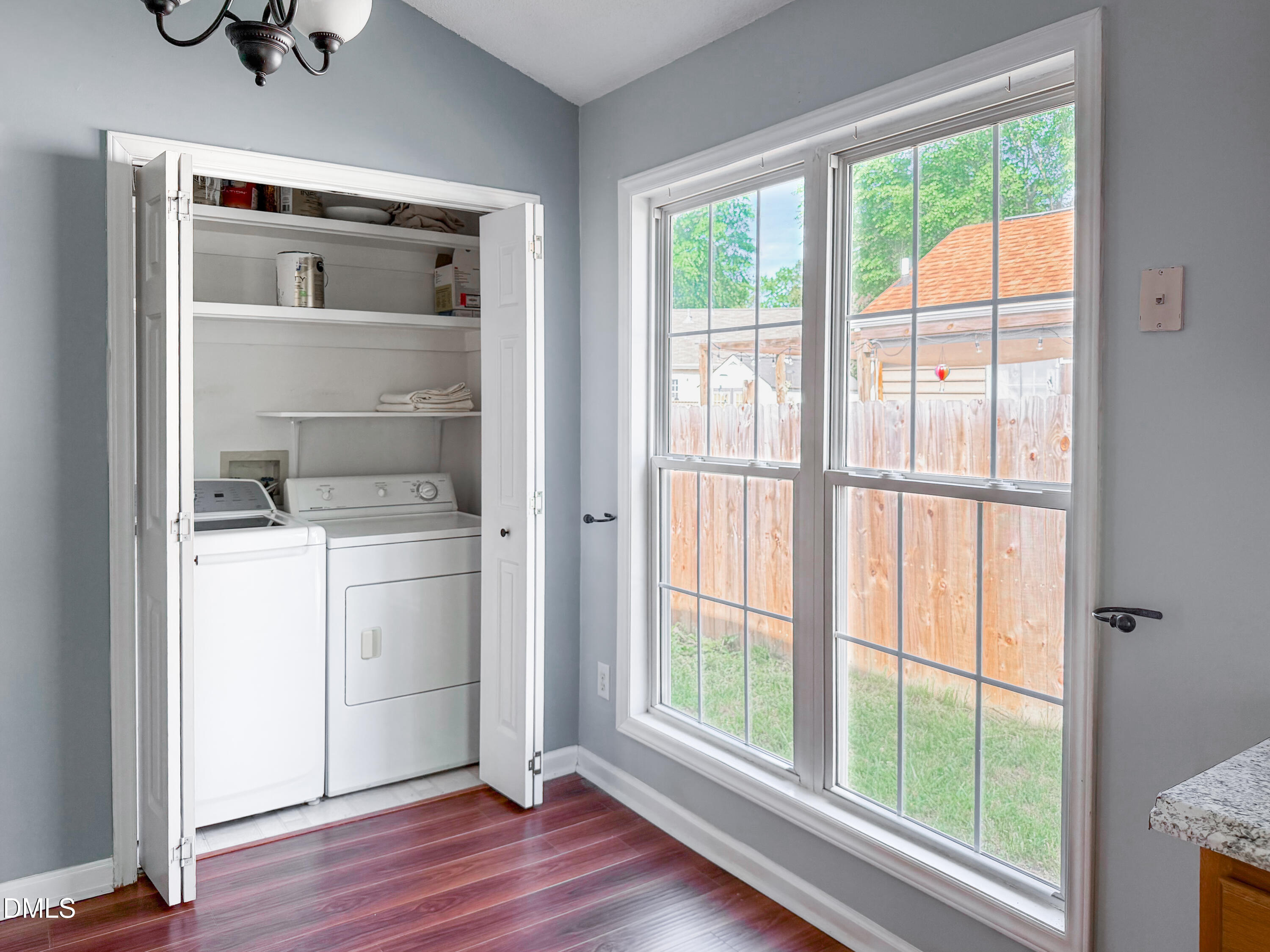 6304 Forest Ridge Drive Durham, NC 27713 - Photo 10 of 29 a room view with wooden floor and windows