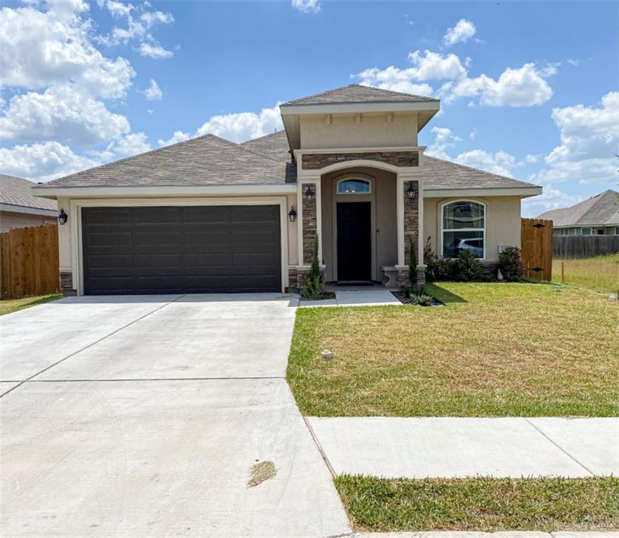 2111 North 26th Street Hidalgo, TX 78557 - Photo 1 of 1 a view of a house with a yard