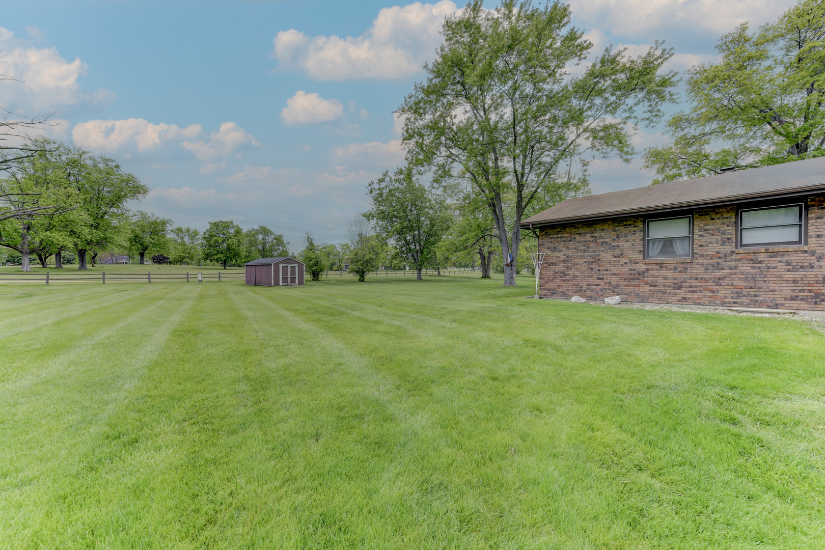126 Denell Drive Crete, IL 60417 - Photo 4 of 30 a view of outdoor space with deck and yard