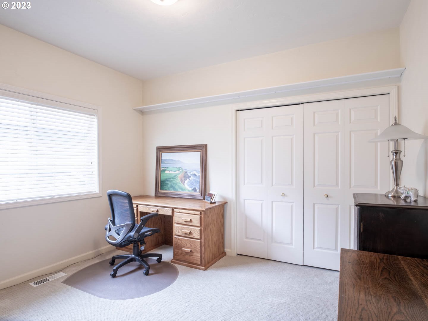 836 Old Orchard Lane Springfield, OR 97477 - Photo 15 of 29 a view of a workspace with furniture and a window
