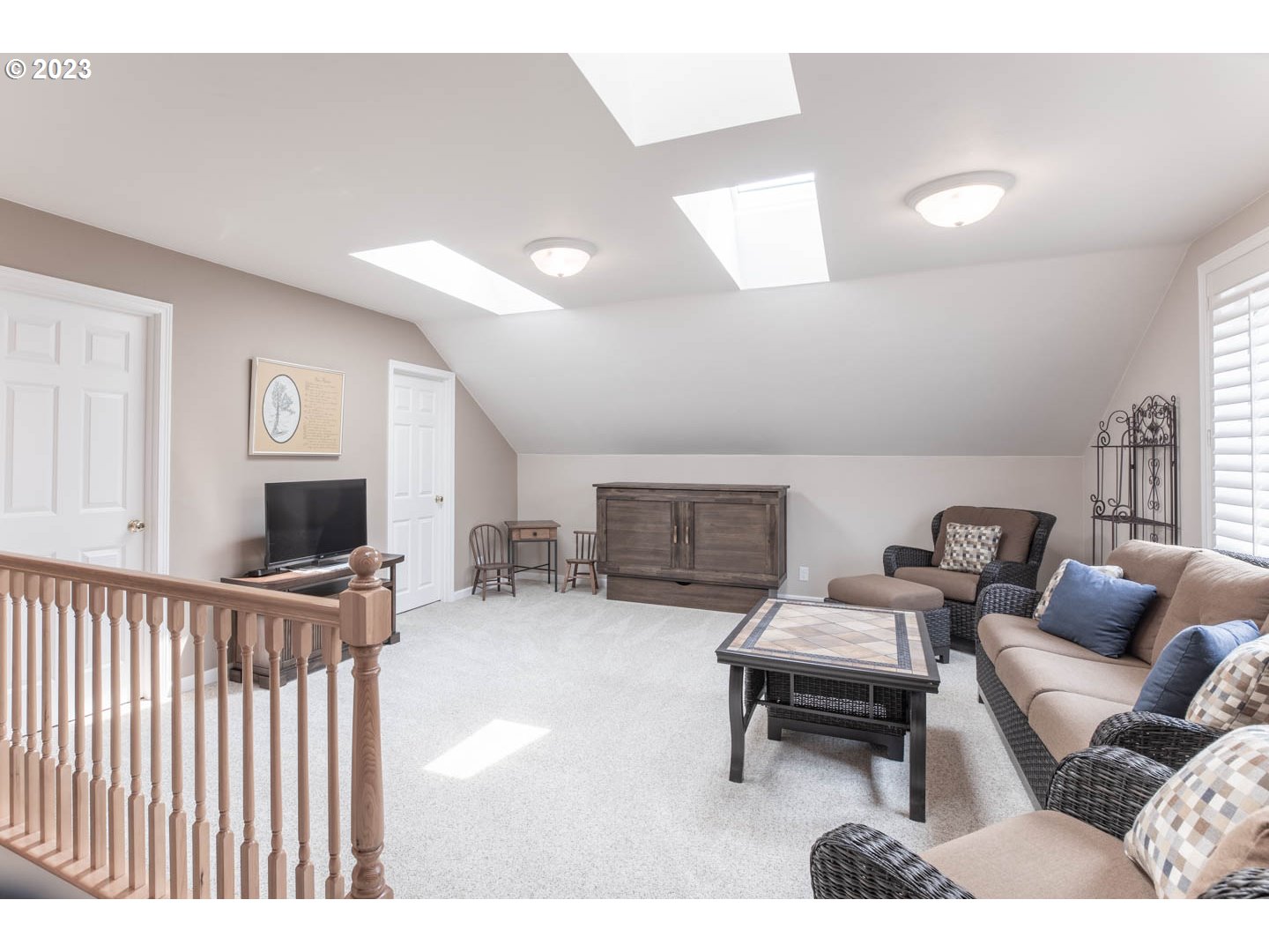 836 Old Orchard Lane Springfield, OR 97477 - Photo 19 of 29 a living room with furniture and a flat screen tv