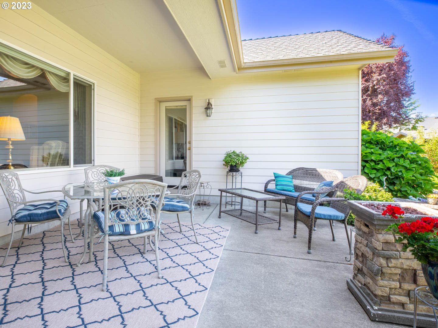 836 Old Orchard Lane Springfield, OR 97477 - Photo 23 of 29 a view of outdoor dining space with a table and chairs