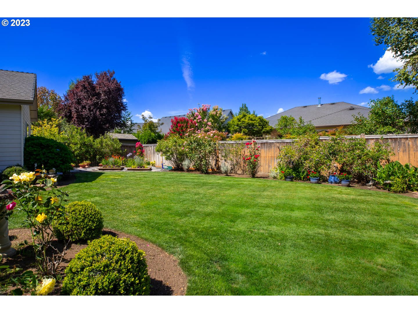 836 Old Orchard Lane Springfield, OR 97477 - Photo 24 of 29 a view of a lake with a house in the background