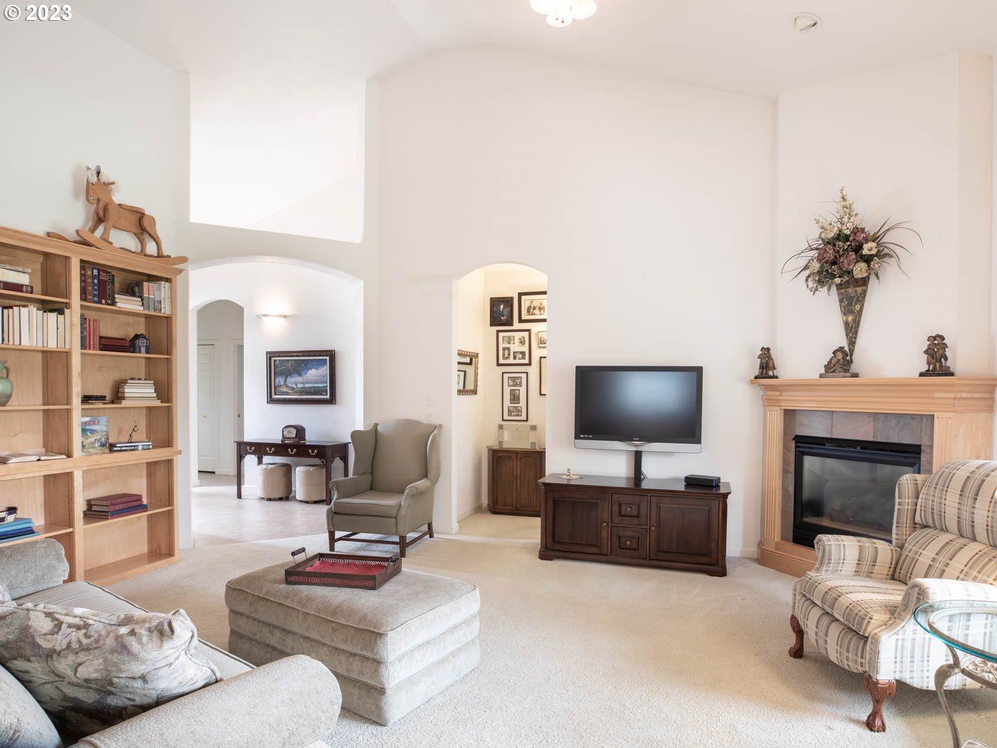 836 Old Orchard Lane Springfield, OR 97477 - Photo 3 of 29 a living room with furniture and a flat screen tv