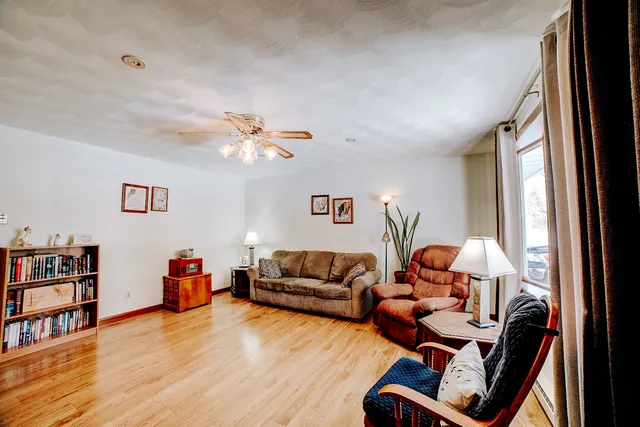 a bedroom with a bed and flat screen tv