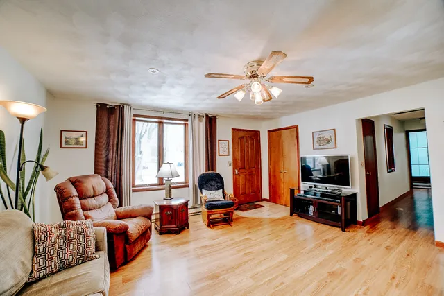 a bathroom with a shower curtain and a curtain