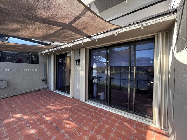 a view of backyard with a chair