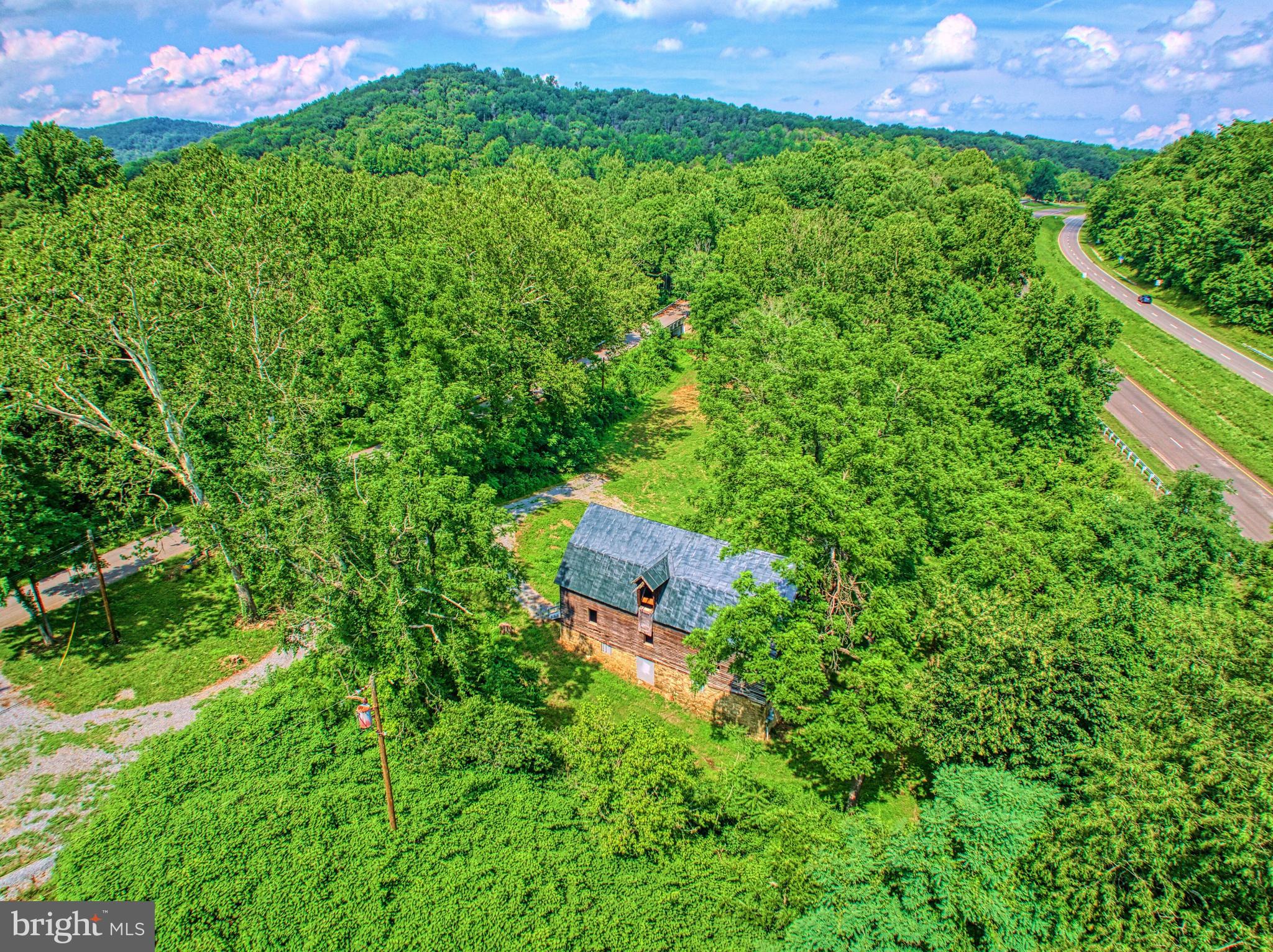 18 Old Mill Road Washington, VA 22747 - Photo 2 of 27 an aerial view of a house with a yard