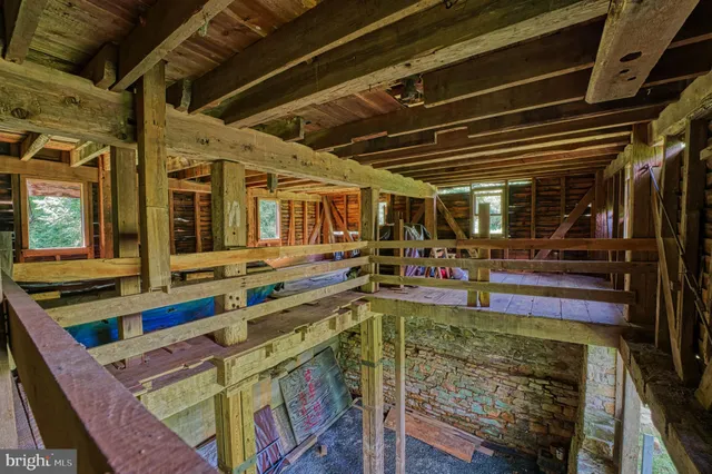 a view of a chairs and table in the patio