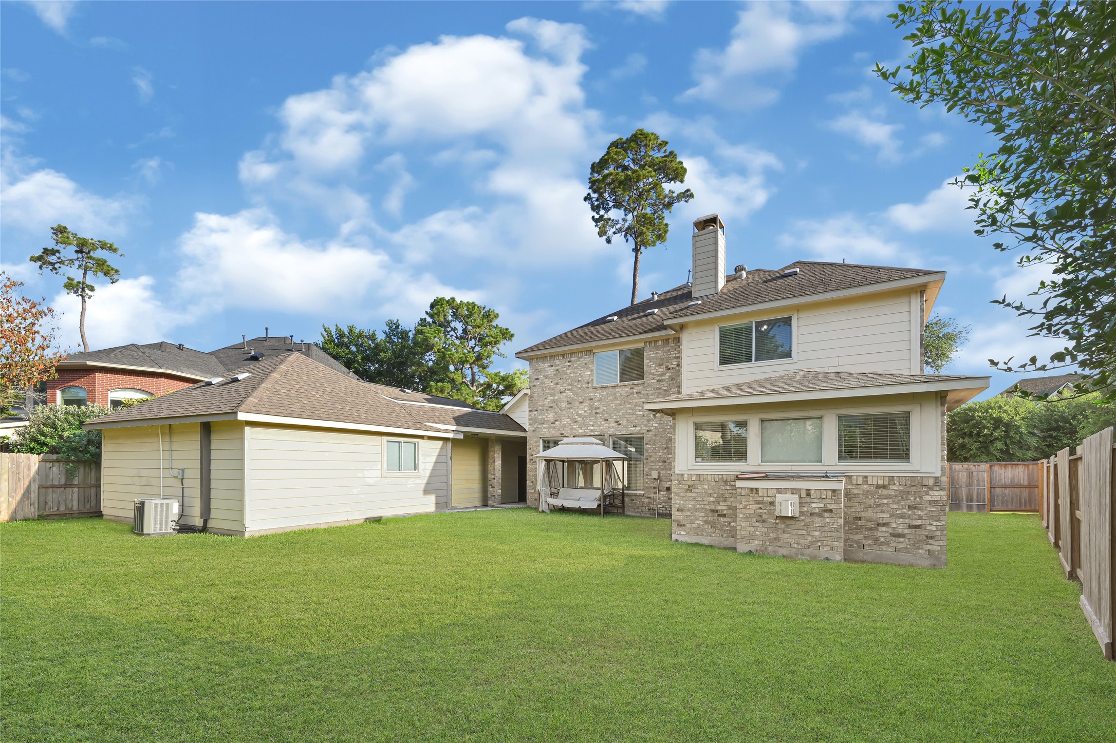 14714 Placid Point Humble, TX 77396 - Photo 4 of 37 The area is fenced providing privacy and the sky is clear and bright.
