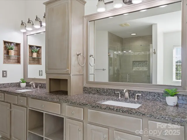 a bathroom with sink and mirror