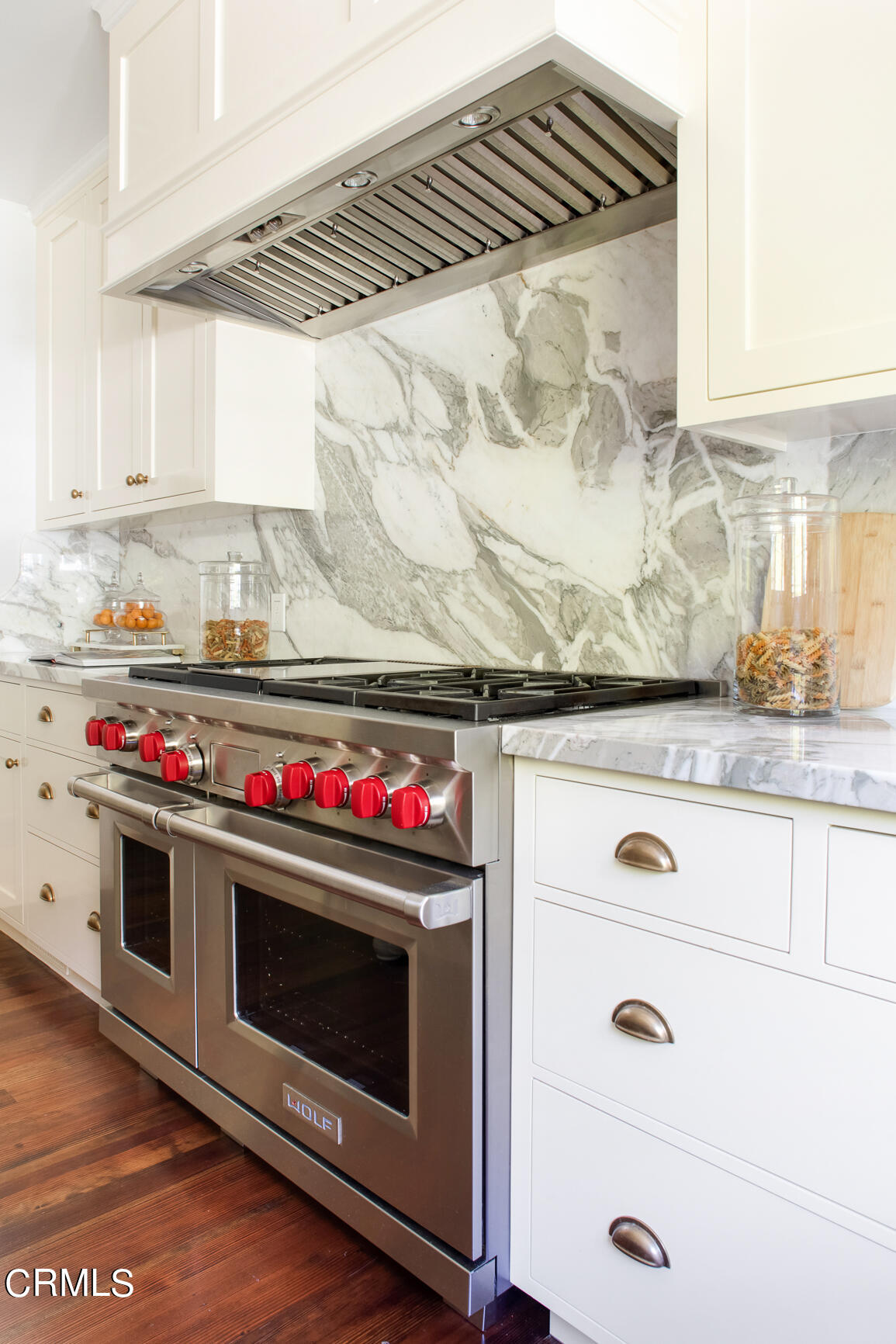735 Holladay Road Pasadena, CA 91106 - Photo 19 of 72 a kitchen with granite countertop a stove and cabinets