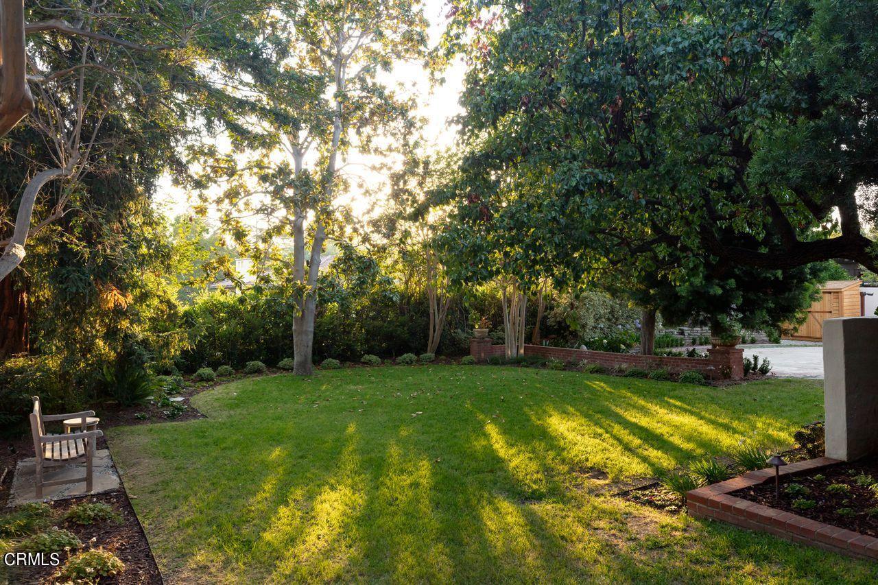 735 Holladay Road Pasadena, CA 91106 - Photo 59 of 72 a view of a backyard with a garden