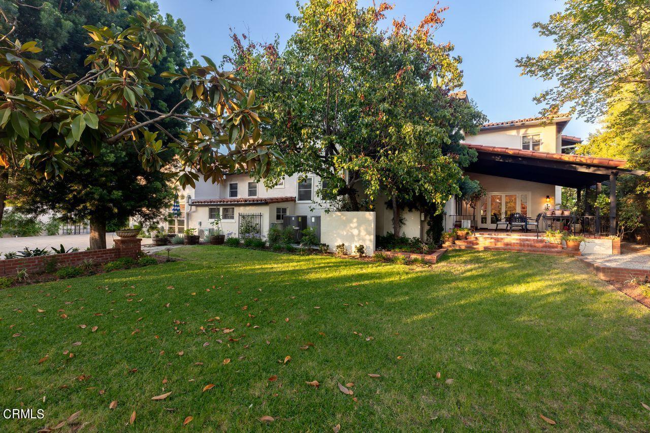 735 Holladay Road Pasadena, CA 91106 - Photo 60 of 72 a front view of a house with a garden