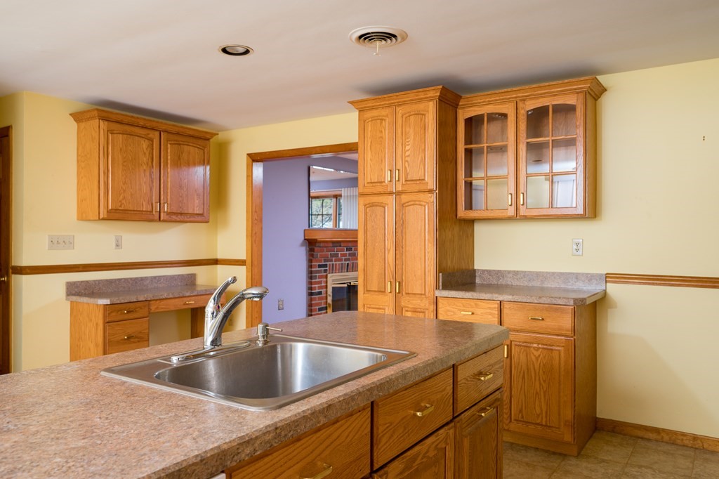 31 Andersen Road Braintree, MA 02184 - Photo 12 of 36 a kitchen with sink and cabinets