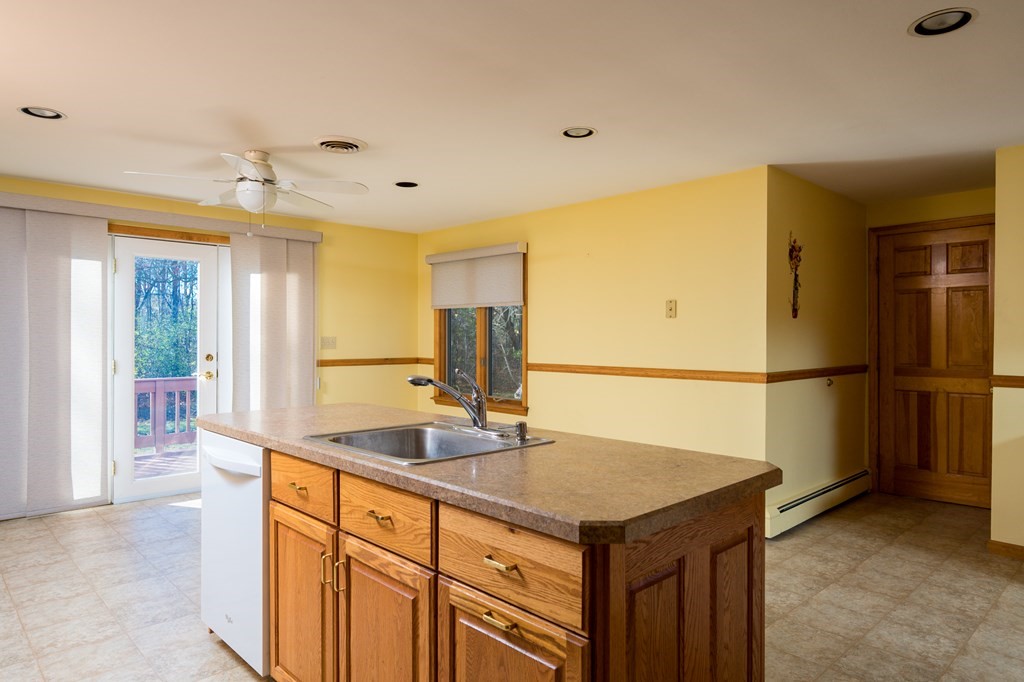 31 Andersen Road Braintree, MA 02184 - Photo 14 of 36 a kitchen with a sink and refrigerator