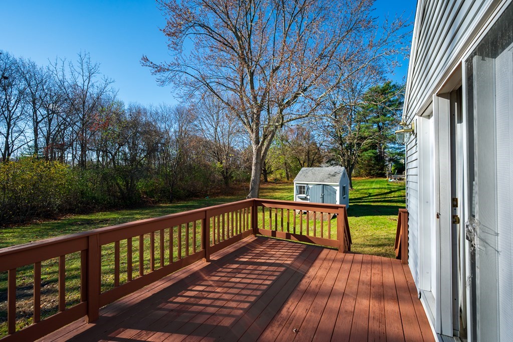 31 Andersen Road Braintree, MA 02184 - Photo 32 of 36 a view of a wooden deck with a yard