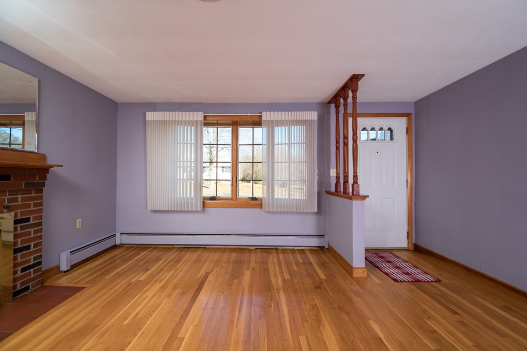 31 Andersen Road Braintree, MA 02184 - Photo 4 of 36 a view of empty room with wooden floor and fan