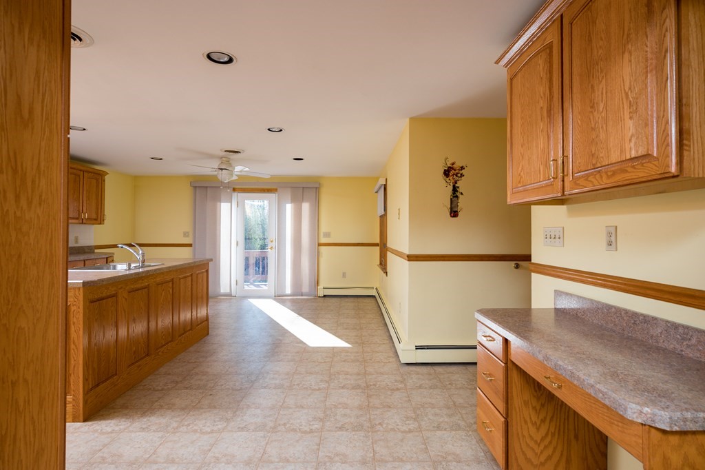 31 Andersen Road Braintree, MA 02184 - Photo 6 of 36 a kitchen with stainless steel appliances granite countertop a refrigerator and a sink