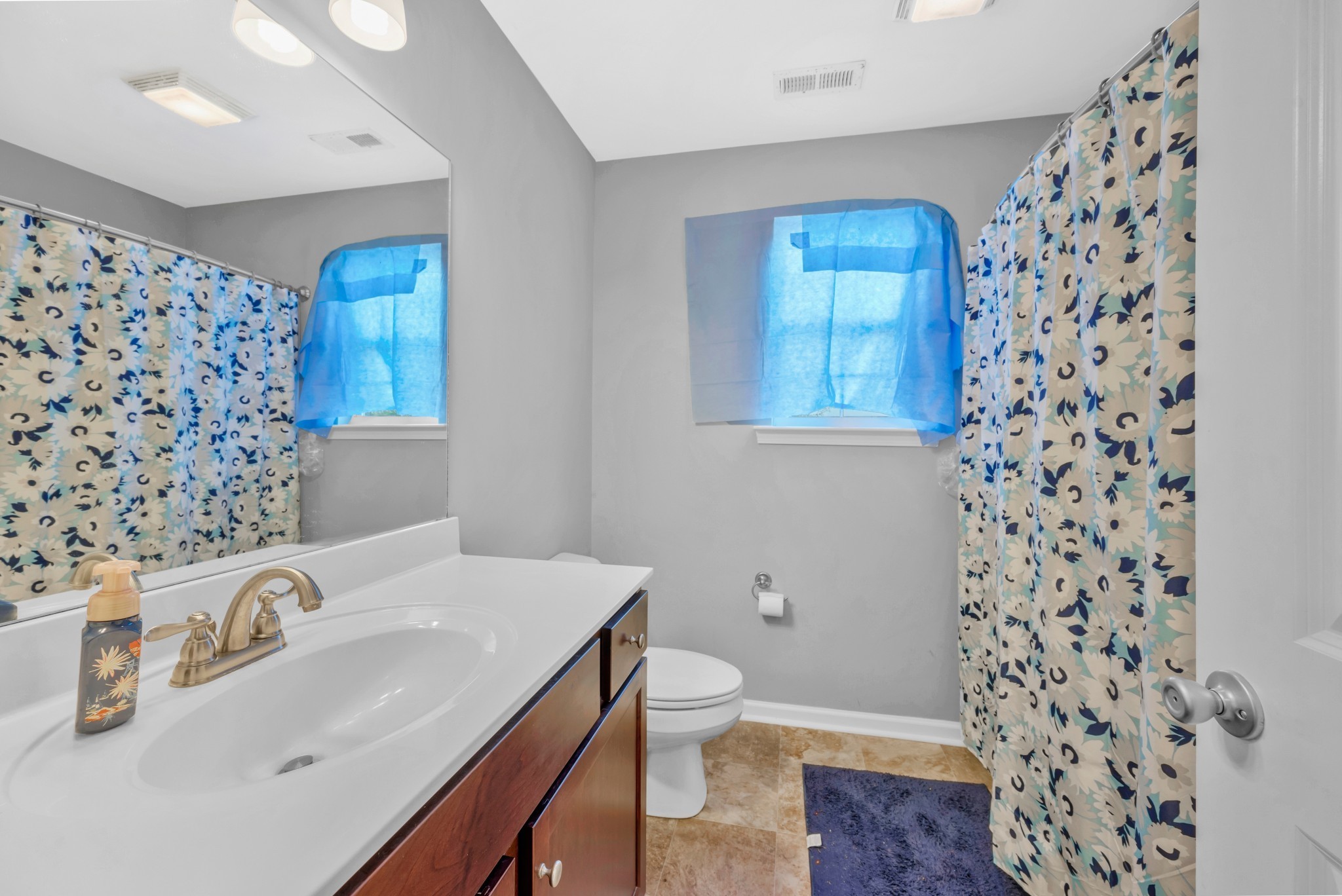 756 Maylene Drive Madison, TN 37115 - Photo 14 of 25 a bathroom with a sink toilet and shower