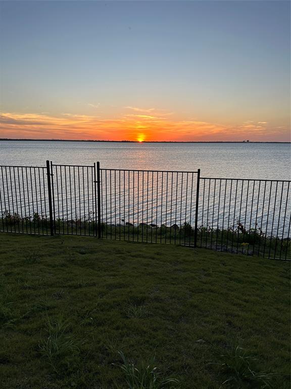 18102 Lakefront Court Forney, TX 75126 - Photo 5 of 5 a view of a golf course with a garden