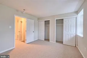 a view of empty room with windows