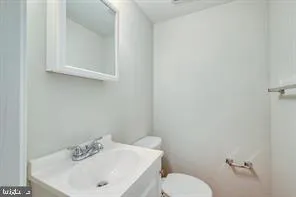 a bathroom with a sink and a toilet