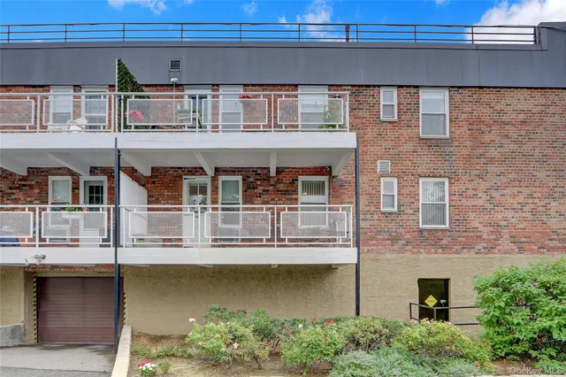 a front view of a house with lake view