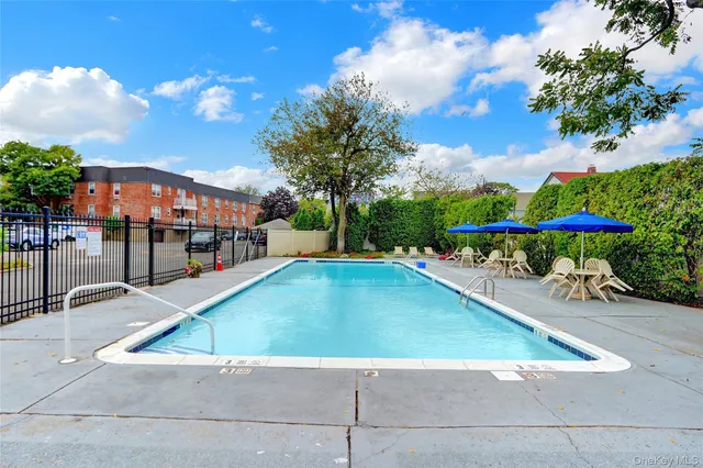 a view of outdoor space swimming pool and furniture