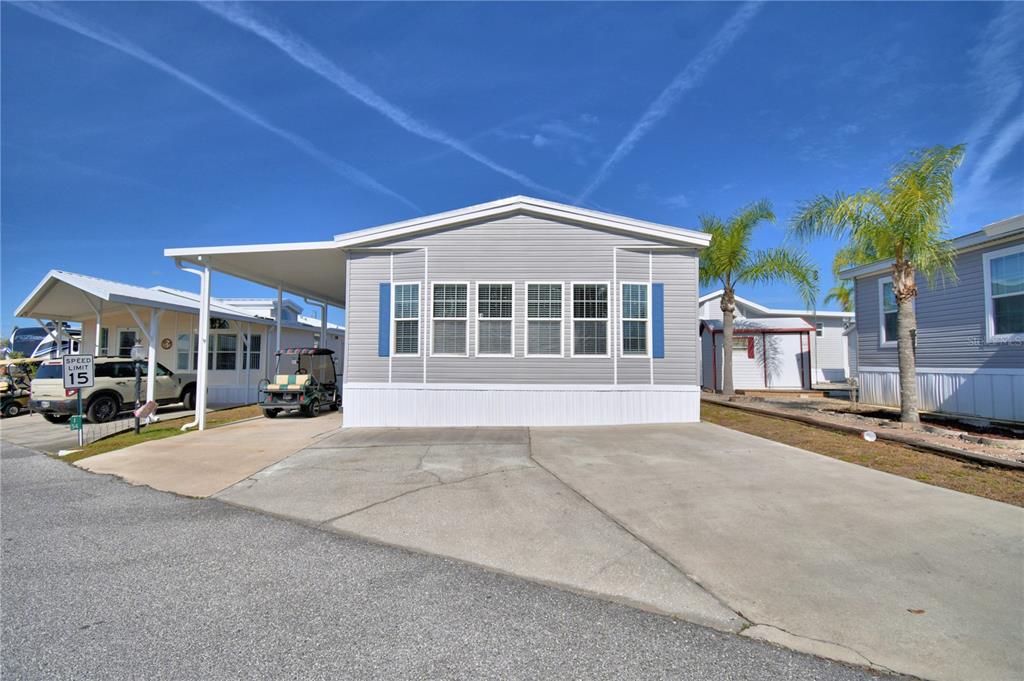 a view of a house with sitting area and garage