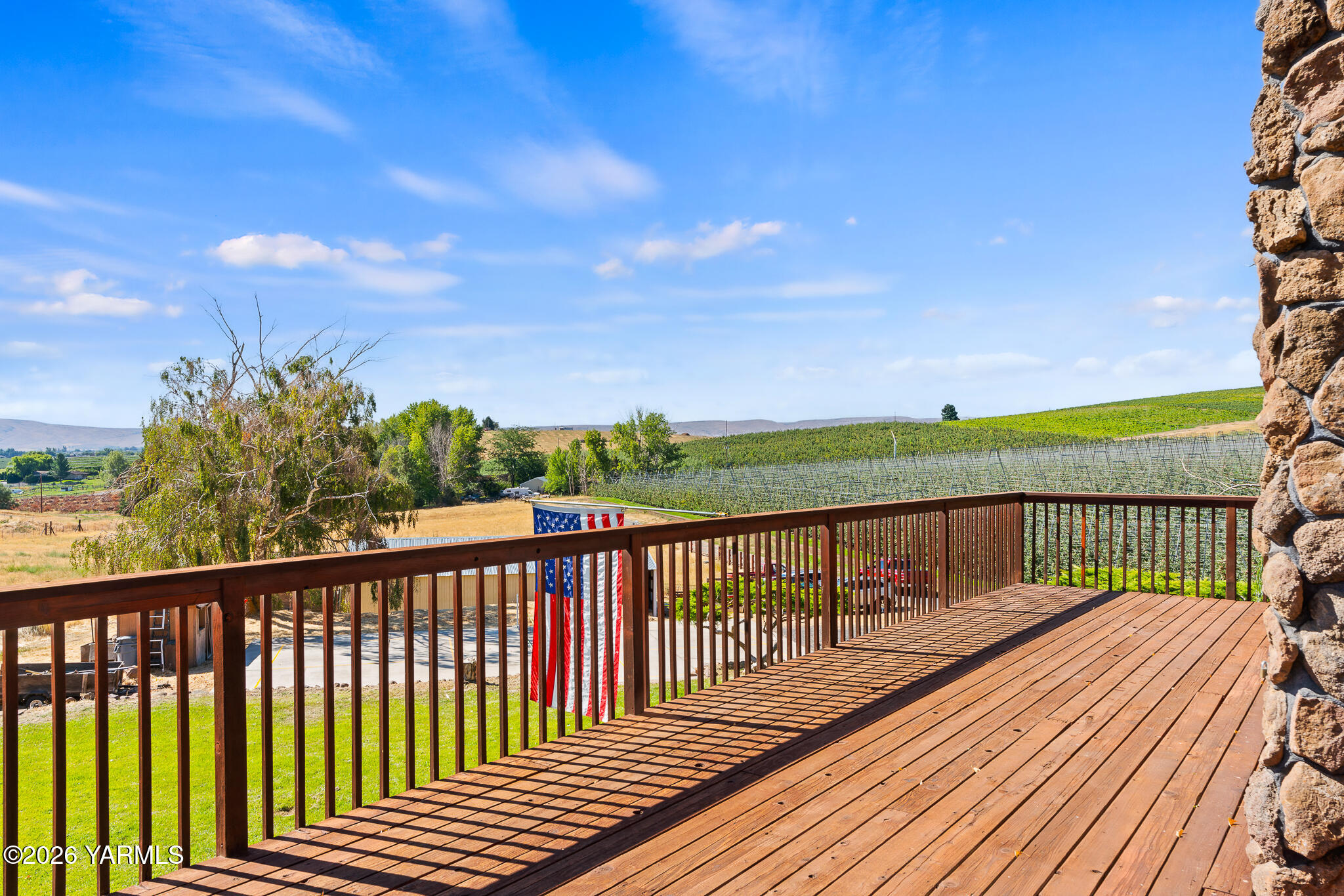 13619 Summitview Ext Road Yakima, WA 98908 - Photo 45 of 56 a view of a balcony with wooden floor & fence