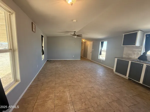 a view of a livingroom with a staircase