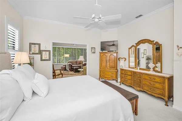 a bed room with a bed and furniture