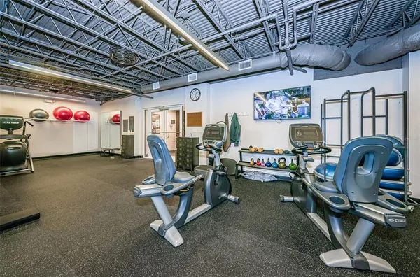 a view of a room with gym equipment